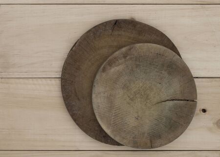 cutting board on wooden background.の写真素材