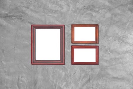concrete wall background with wooden picture frame for decoration background.