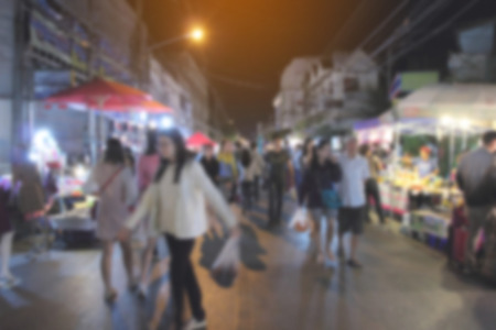 Abstract blur of market walking street at night.の写真素材