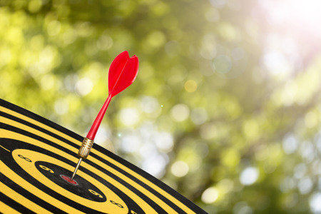 dart target board, abstract of success with abstract nature bokeh blur background.