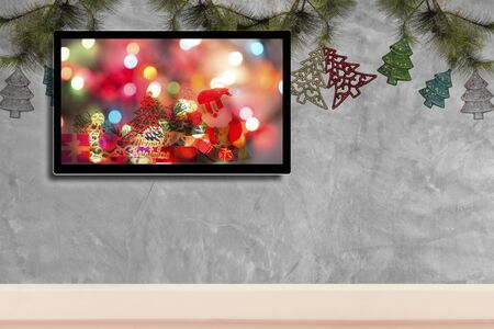 christmas decoration with hdtv on concrete wall backgroundの写真素材