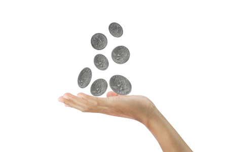 coins in hand isolated on white backgroundの写真素材