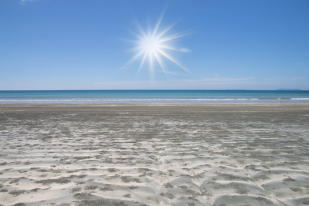beautiful scene, tropical sea and beach with blue sky backgroundの写真素材