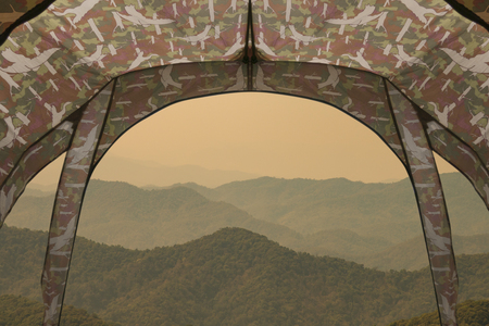 Tent lookout on a camp with the mountain hill.の写真素材