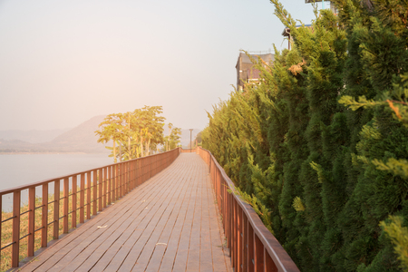 wooden terrace walkway at river side.の写真素材