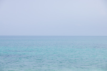 beautiful scene, tropical sea and beach with blue sky backgroundの写真素材