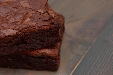 homemade cake chocolate brownies on wooden tableの写真素材