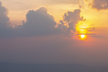 sun with clouds in evening timeの写真素材