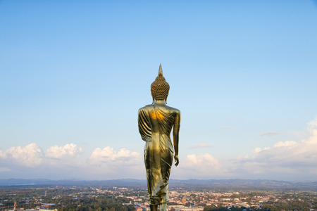 Golden Buddha statue standing at Wat Phra That Khao Noi, Nan Province, Thailandの写真素材