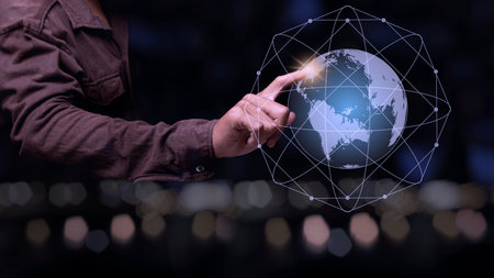 Businessman pointing spot on the global connection lines, Business network concept.の写真素材