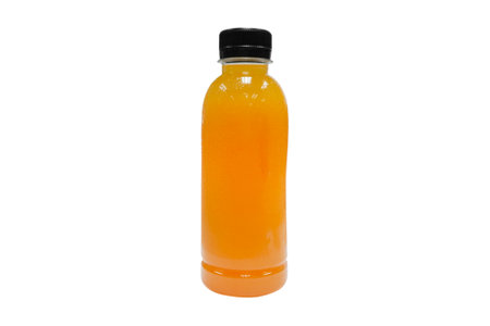 100% Orange juice bottle isolated on white background.の写真素材