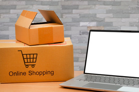 Online shopping with computer laptop for small business SME at home. online business and E-commerce.