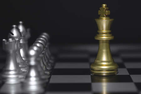 Shot of chessboard golden king moving. Concept for strategy, business victory.の写真素材