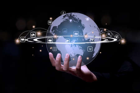 Businessman holding global network connection. concept of global business.Digital link tech.の写真素材