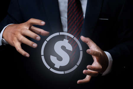 Businessman with money currency icon. concept about global finance.の写真素材