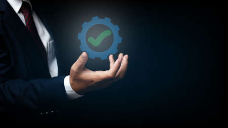 Businessman shows sign top service Quality assurance, ISO certification, Assurance and standardization concept.の写真素材