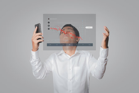 Businessman using smartphone trader forex stock, feeling disappointed, unhappy and negative gesture. Stock Market Investments analysis and Digital Assets. Business finance and investment concept.の写真素材