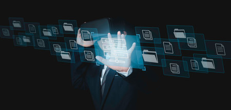 Document Management System (DMS). Global Internet connection metaverse,  Businessman wearing VR glasses virtual searching online documentation database and process automation. Business processes.の写真素材
