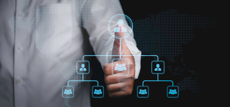 Business technology connected together. Businessman pressing button with contact on virtual screens. Cooperation, teamwork, network and community concept.の写真素材