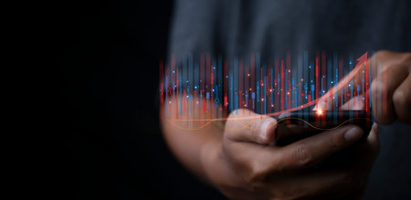 Stock Market Investments analysis and Digital Assets. Business finance technology and investment concept. Stock market graph man with stock trading screen background.の写真素材