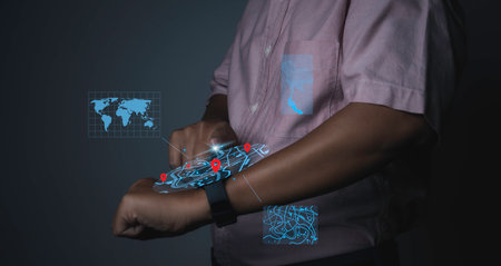 Man using smart watch technology find virtual model map with location point, icon maps and find places in the online system, Connection line over the map, Navigation concept.の写真素材