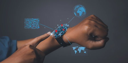 Man using smart watch technology find virtual model map with location point, icon maps and find places in the online system, Connection line over the map, Navigation concept.の写真素材