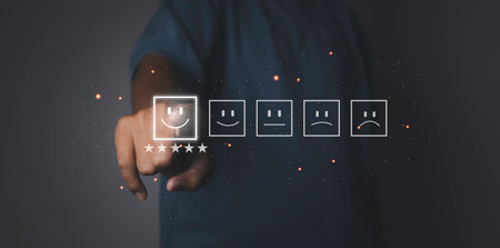 Customer satisfaction experience concept. Businessman giving high score with five golden stars rating satisfaction in service. rating very impressed. copy space.の写真素材
