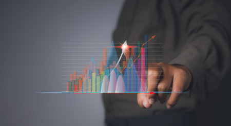 Goal business success strategy chart target. Business finance marketing  and investment. Stock market graph with man pointing financial profit stock market development.の写真素材