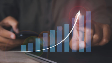 Goal business success strategy chart target. Business finance marketing  and investment. Stock market graph with man pointing financial profit stock market development.の写真素材