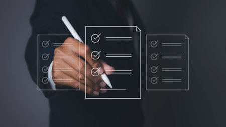 Electronic signature and paperless office concept. Businessman uses a pen sign electronic documents...