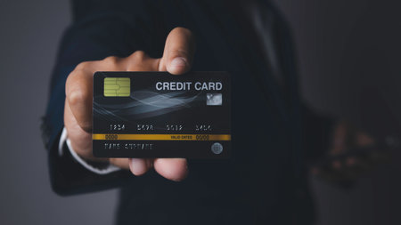 Businessman show credit card E-commerce business online. Shopping online by credit card with mobile...