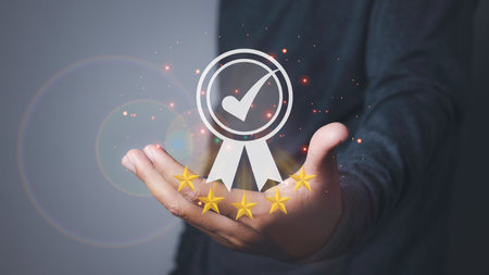Man holding quality assurance, Guarantee, Standards, ISO certification and standardization. Quality management control. conformity to international standards.の写真素材