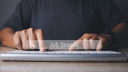 Job search, Searching browsing internet data information networking. Man browsing work opportunities online by computer and smart phone. Search Engine Optimization SEO Networking. copy space.の写真素材