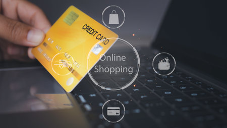 Shopping online by credit card with computer laptop. Businessman paying by credit card, making online shopping  payment E-commerce business online. copy space.の写真素材