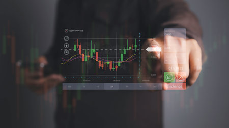 Stock Market Investments analysis and Digital Assets. Business finance technology and investment concept. Stock market graph with man touching stock trading screen background.の写真素材