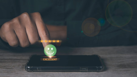 Customer satisfaction experience concept. Businessman giving high score with five golden stars rating satisfaction in service. rating very impressed. copy space.の写真素材