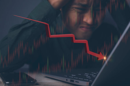 Businessman with red arrow graph drop arrow down. Stock crisis, financial problems, recession,...