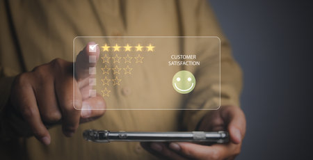 Man giving high score for feedback review satisfaction service. Customer satisfaction experience with five star icon and excellent for feedback review satisfaction service.の写真素材