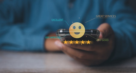 Man giving high score for feedback review satisfaction service. Customer satisfaction experience with five star icon and excellent for feedback review satisfaction service.の写真素材