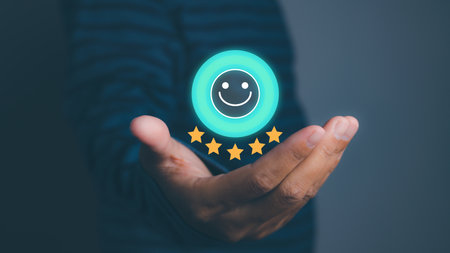 Man hand holding happy smile face positive mindset selection for feedback review satisfaction service. rating very impressed. Best quality. Customer satisfaction experience concept. copy space.の写真素材