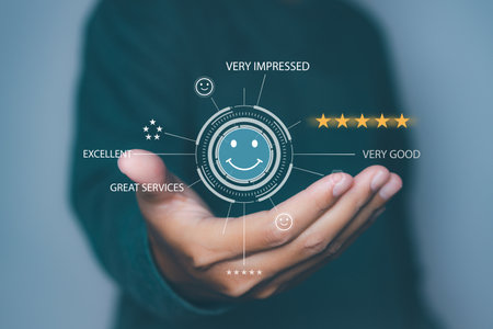 Man hand holding happy smile face positive mindset selection for feedback review satisfaction service. rating very impressed. Best quality. Customer satisfaction experience concept. copy space.の写真素材