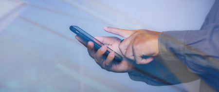 Man hand using mobile smartphone. copy space.
