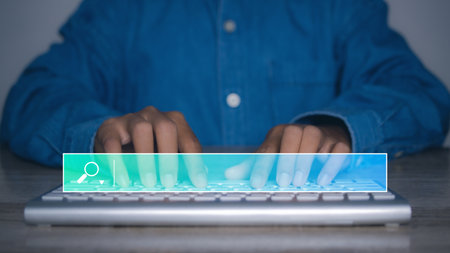 Searching browsing internet data information networking concept. Search Engine Optimization SEO Networking. Man hand presses the information search button on search bar virtual screen, copy space.の写真素材