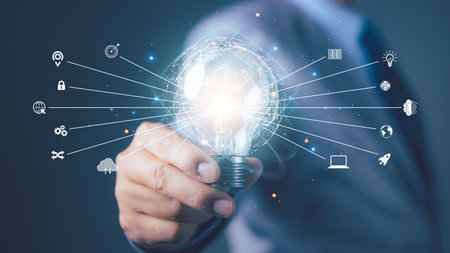 Businessman holding light bulb the new ideas and creative. Business; Development; Concept of new ideas creativity. Innovation and digital transformation change management; internet of things.の写真素材