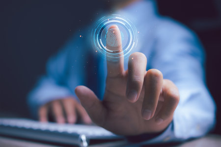 Businessman access scan fingerprint biometric identity and approval. Secure access granted by valid...