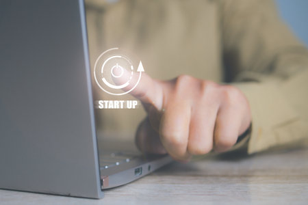 Businessman press button startup business. On button start in new business progress. Start up business concept. opy space.の写真素材