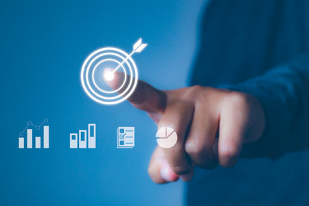 Businessman touch arrow dart icon with planning and target for business.の写真素材