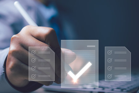 Businessman approve online electronic paper for ISO quality document control.の写真素材