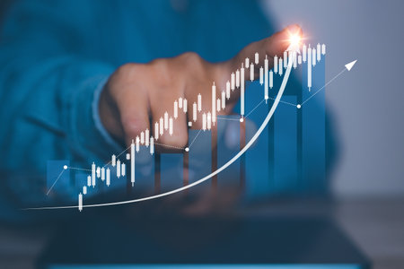 Businessman using laptop trading forex stock market. Business financial data.の写真素材
