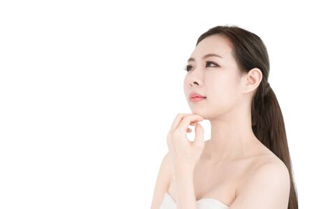 Asian beauty women present skin for skin care product on white backgroundの写真素材
